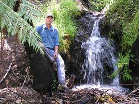 Gavin Keating beside the entrance to the lower Palmerston adit, Crooked River goldfield, Victoria.