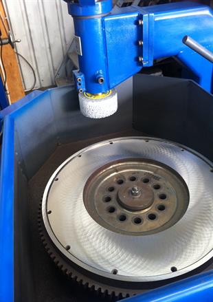 Deva Engineering Flywheel grinder, early stone grinding medium.