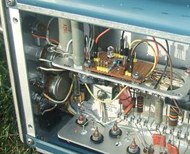 Small board is inserted into Tek 133 chassis to hold 05v output converter