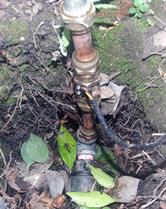 Hall effect flowmeter inserted after meter