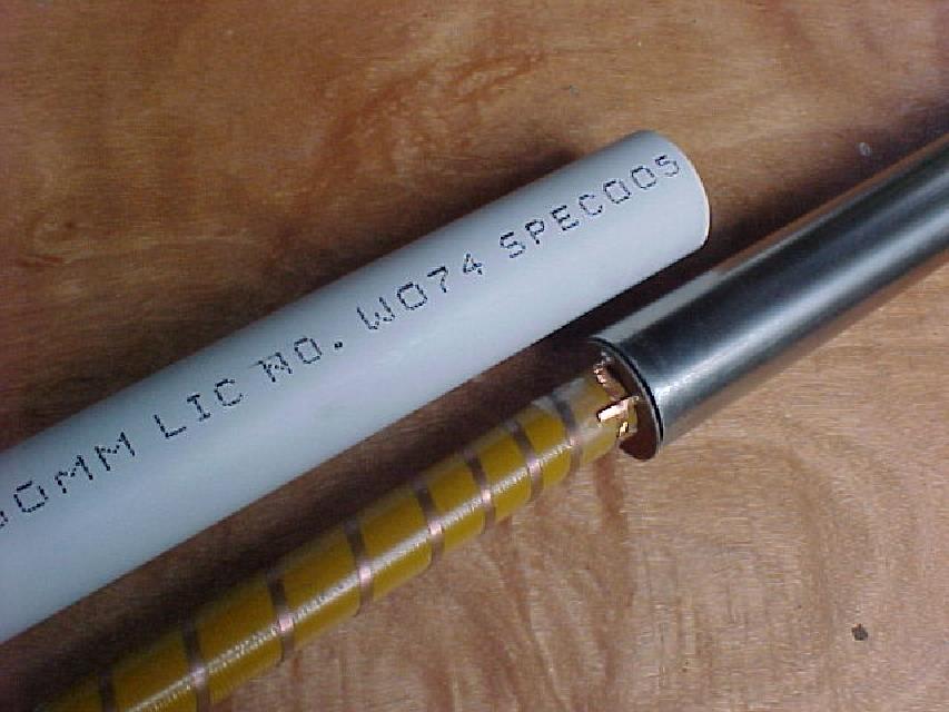 DIY 2.4 GHz reduced groundplane helical antenna DIY reduced groundplane helical antenna for 2.4 GHz, wouns using leadlighter's tape on fiberglass tube.